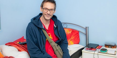 A calm one-to-one conversation in a resident's room